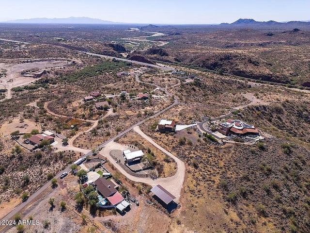 drone / aerial view featuring a mountain view