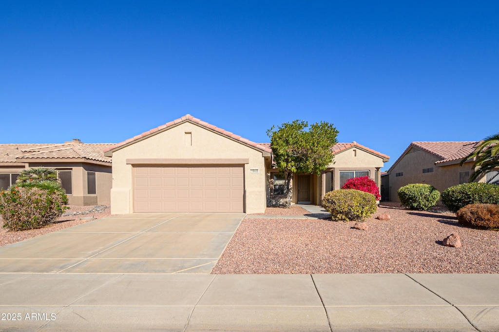 view of front of home with a garage