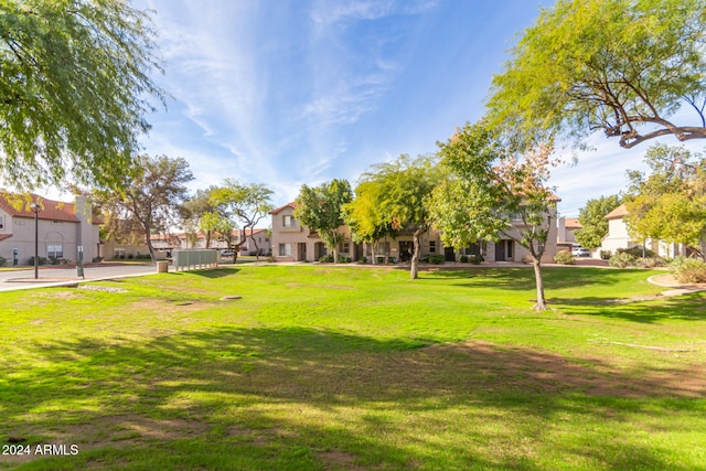 surrounding community with a lawn