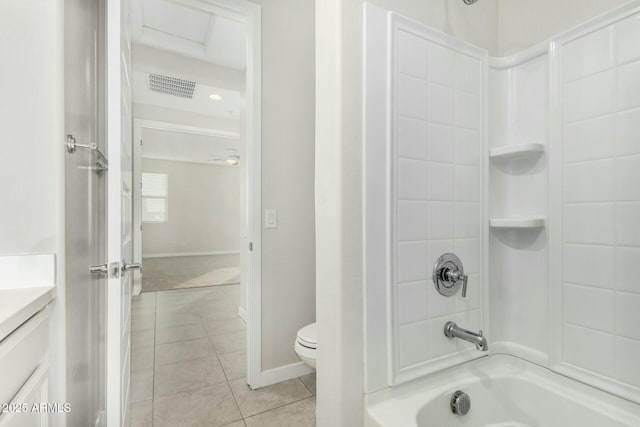 full bathroom featuring vanity, tub / shower combination, tile patterned floors, and toilet