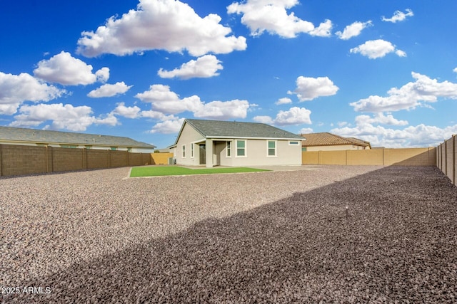 rear view of property featuring a patio area