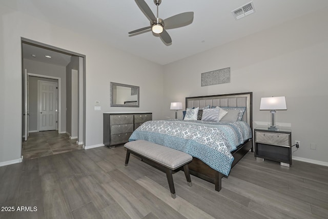 bedroom with ceiling fan and wood-type flooring