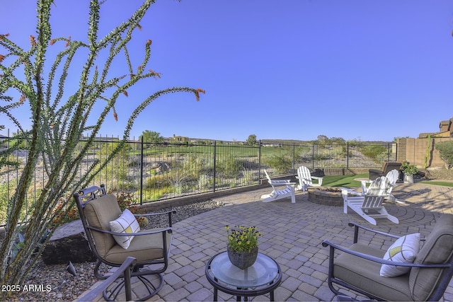 view of patio featuring a fire pit