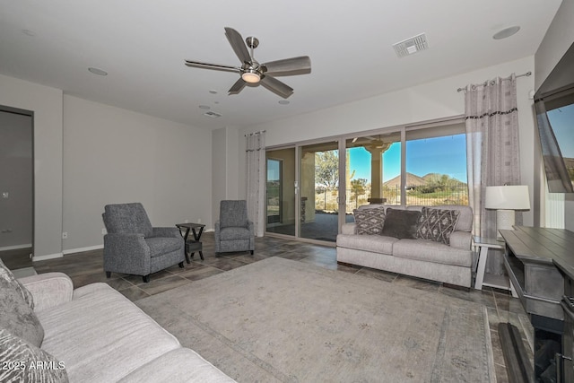 living room featuring ceiling fan