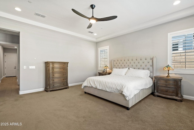 carpeted bedroom with recessed lighting, visible vents, and baseboards