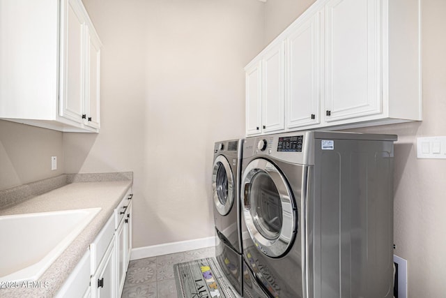 6328 W Fetlock Trl, Phoenix, AZ 85083 - laundry area featuring cabinet space, independent washer and dryer, baseboards, and a sink