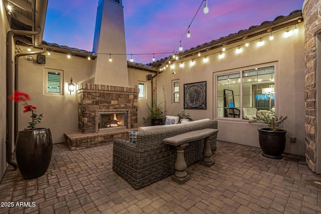 6328 W Fetlock Trl, Phoenix, AZ 85083 - view of patio / terrace with an outdoor stone fireplace