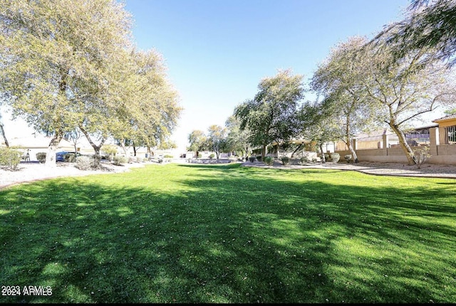 surrounding community with a lawn