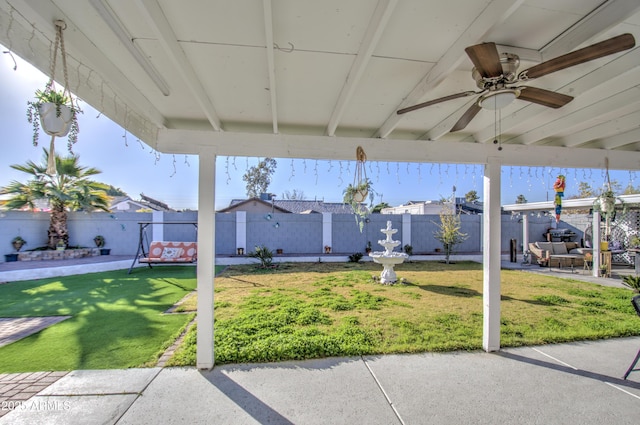 view of patio / terrace featuring ceiling fan and an outdoor living space