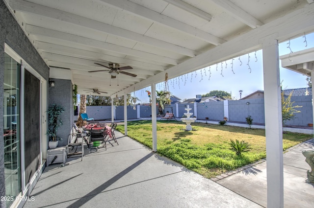 view of patio with ceiling fan