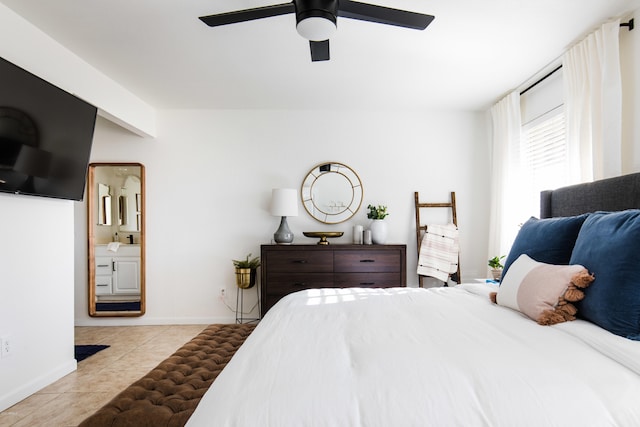 bedroom featuring tile patterned flooring, ceiling fan, and baseboards