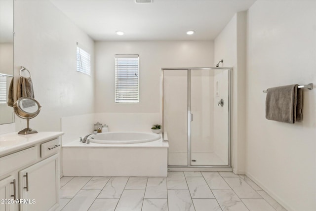 732 W Flintlock Way, Chandler, AZ 85286 - full bathroom featuring marble look tile flooring, a shower stall, vanity, a garden tub, and recessed lighting