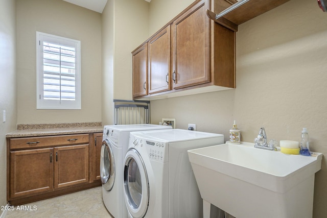 4497 E Ficus Way, Gilbert, AZ 85298 - laundry area featuring a sink, cabinet space, and washing machine and clothes dryer