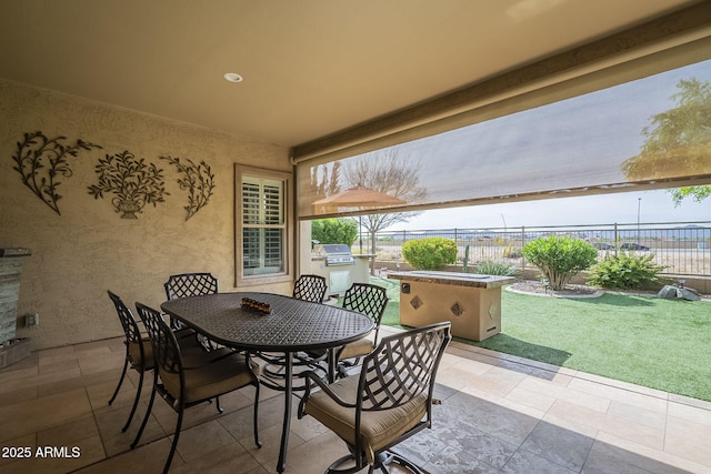4497 E Ficus Way, Gilbert, AZ 85298 - view of patio with outdoor dining space, fence, exterior kitchen, and a grill