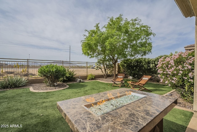4497 E Ficus Way, Gilbert, AZ 85298 - view of yard featuring fence and a fire pit