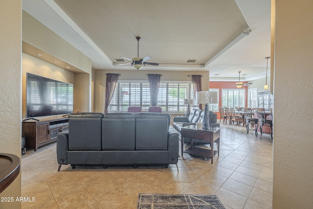 4497 E Ficus Way, Gilbert, AZ 85298 - living room with a raised ceiling, a ceiling fan, light tile patterned flooring, and visible vents