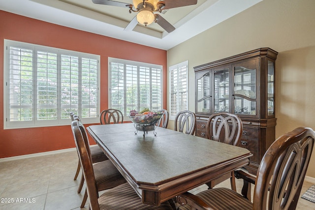 4497 E Ficus Way, Gilbert, AZ 85298 - dining area with baseboards, ceiling fan, light tile patterned flooring, and a healthy amount of sunlight