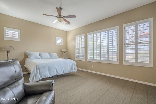 4497 E Ficus Way, Gilbert, AZ 85298 - carpeted bedroom with baseboards, visible vents, and ceiling fan