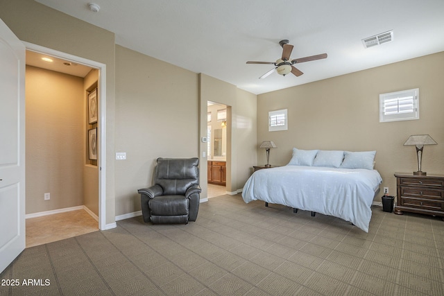 4497 E Ficus Way, Gilbert, AZ 85298 - carpeted bedroom with baseboards, multiple windows, ensuite bathroom, and visible vents