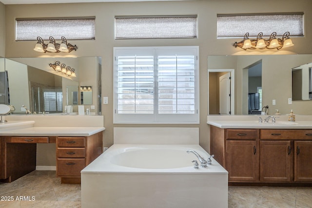 4497 E Ficus Way, Gilbert, AZ 85298 - full bath featuring two vanities, a sink, tile patterned flooring, and a garden tub