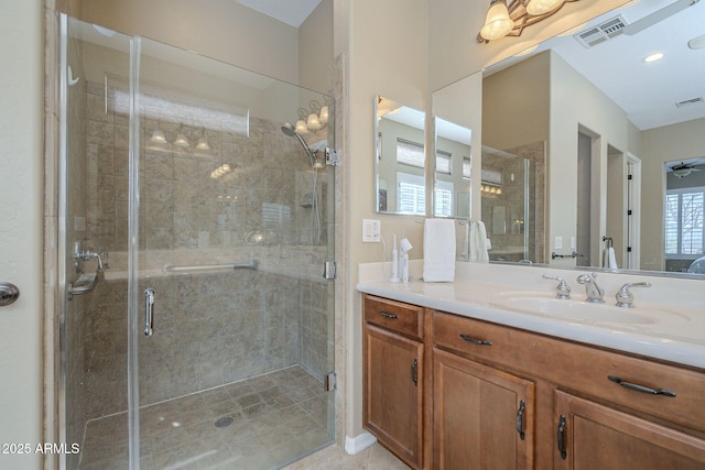 4497 E Ficus Way, Gilbert, AZ 85298 - bathroom featuring visible vents, a shower stall, and vanity