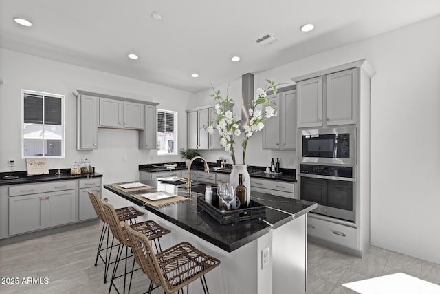 2149 W Rowel Rd, Phoenix, AZ 85085 - kitchen with built in microwave, oven, and gray cabinetry