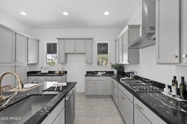 2149 W Rowel Rd, Phoenix, AZ 85085 - kitchen with appliances with stainless steel finishes, a sink, gray cabinetry, and wall chimney exhaust hood