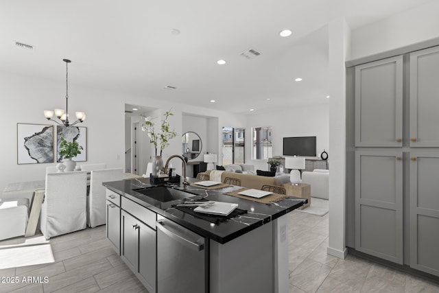 2149 W Rowel Rd, Phoenix, AZ 85085 - kitchen with dark countertops, stainless steel dishwasher, gray cabinets, and a sink