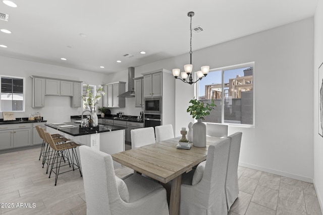 2149 W Rowel Rd, Phoenix, AZ 85085 - dining space featuring visible vents, recessed lighting, a notable chandelier, and baseboards