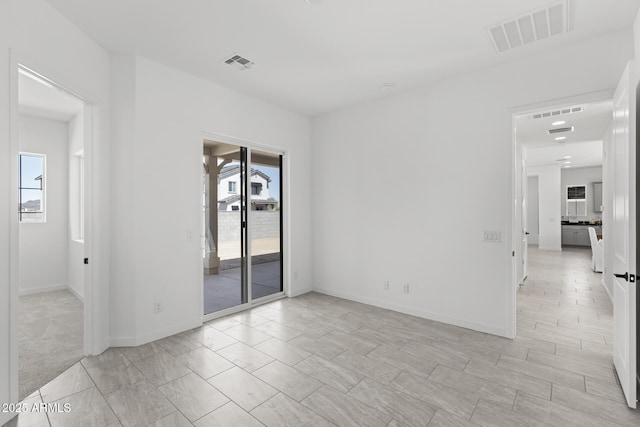2149 W Rowel Rd, Phoenix, AZ 85085 - empty room featuring baseboards and visible vents