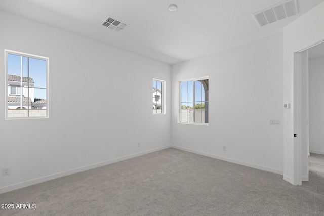 2149 W Rowel Rd, Phoenix, AZ 85085 - spare room with visible vents, baseboards, and plenty of natural light