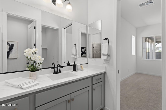 2149 W Rowel Rd, Phoenix, AZ 85085 - bathroom featuring baseboards, visible vents, and vanity