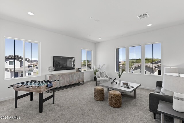 2149 W Rowel Rd, Phoenix, AZ 85085 - living room featuring carpet flooring, recessed lighting, visible vents, and baseboards