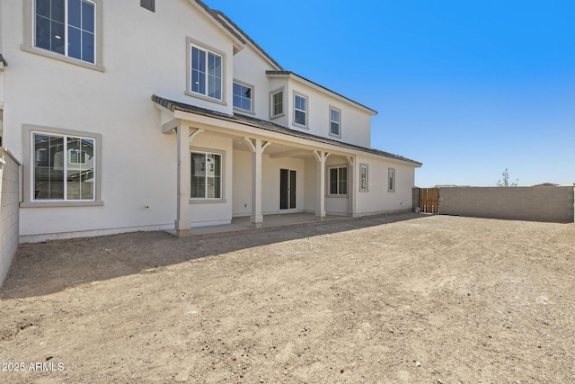 2149 W Rowel Rd, Phoenix, AZ 85085 - rear view of house featuring fence, stucco siding, and a patio area
