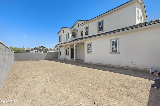 2149 W Rowel Rd, Phoenix, AZ 85085 - back of house featuring a patio, stucco siding, and a fenced backyard