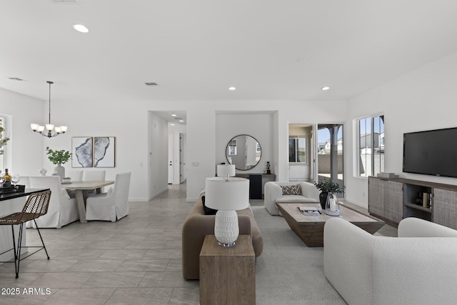 2149 W Rowel Rd, Phoenix, AZ 85085 - living room featuring visible vents, recessed lighting, a notable chandelier, and baseboards