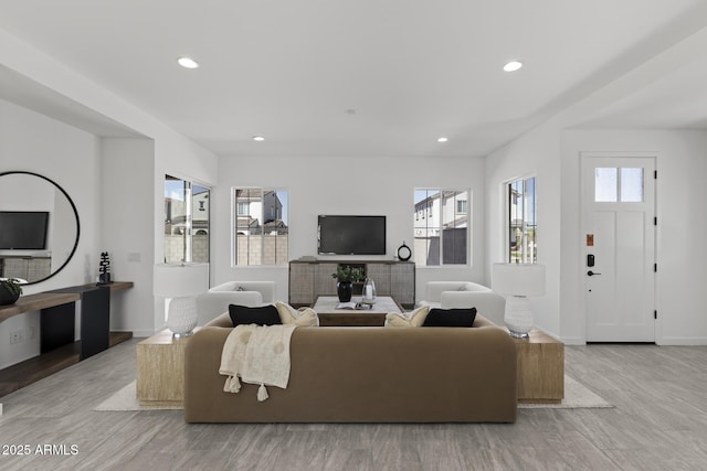 2149 W Rowel Rd, Phoenix, AZ 85085 - living area featuring recessed lighting, wood finished floors, and baseboards