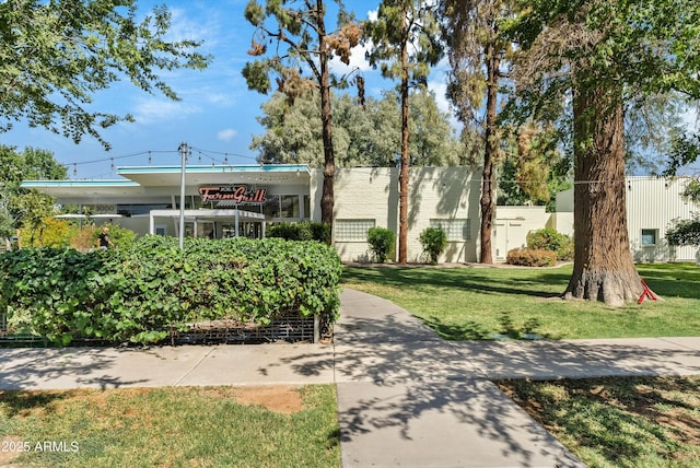 exterior space featuring a front lawn