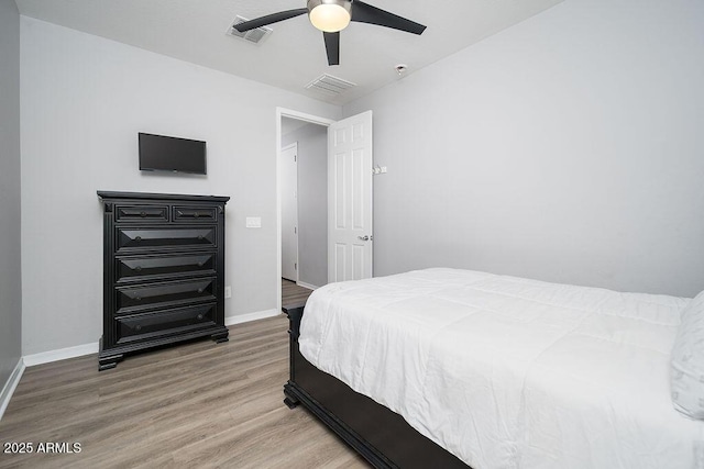 2321 W Brookhart Way, Phoenix, AZ 85085 - bedroom featuring wood finished floors, baseboards, and a ceiling fan