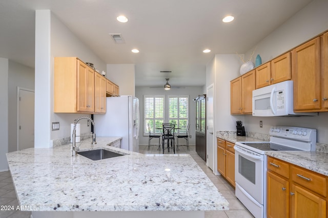 19892 N Shadow Mountain Dr, Surprise, AZ 85374 - kitchen with visible vents, a sink, a peninsula, recessed lighting, and white appliances