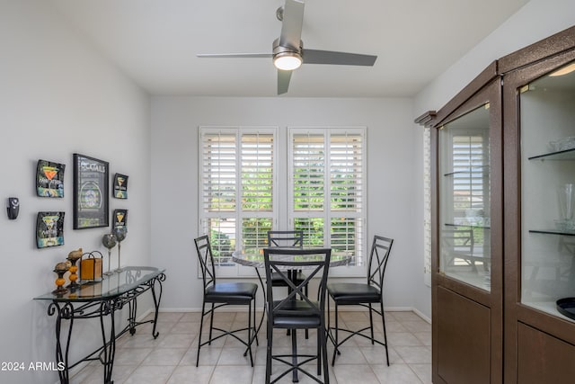 19892 N Shadow Mountain Dr, Surprise, AZ 85374 - dining space with baseboards, ceiling fan, and a wealth of natural light
