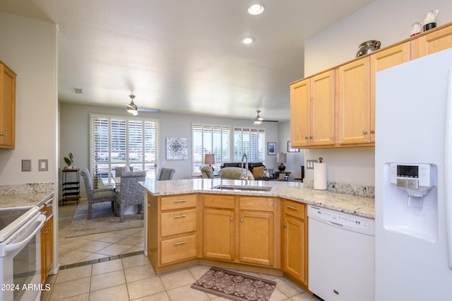19892 N Shadow Mountain Dr, Surprise, AZ 85374 - kitchen featuring ceiling fan, a sink, white appliances, a peninsula, and light tile patterned floors