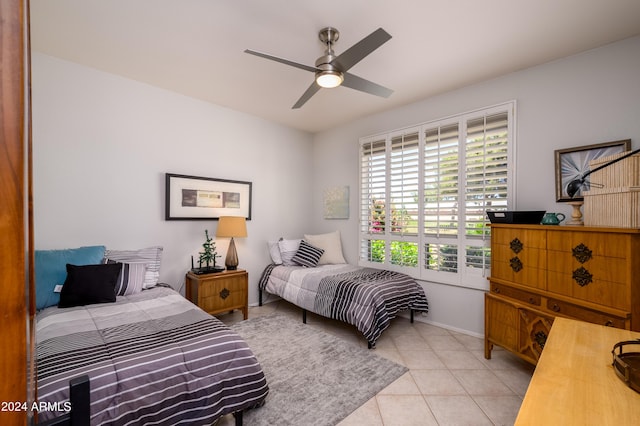 19892 N Shadow Mountain Dr, Surprise, AZ 85374 - bedroom with baseboards, ceiling fan, and light tile patterned floors