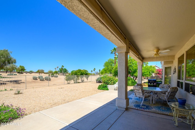 19892 N Shadow Mountain Dr, Surprise, AZ 85374 - view of patio / terrace featuring ceiling fan, outdoor dining space, and a fenced backyard