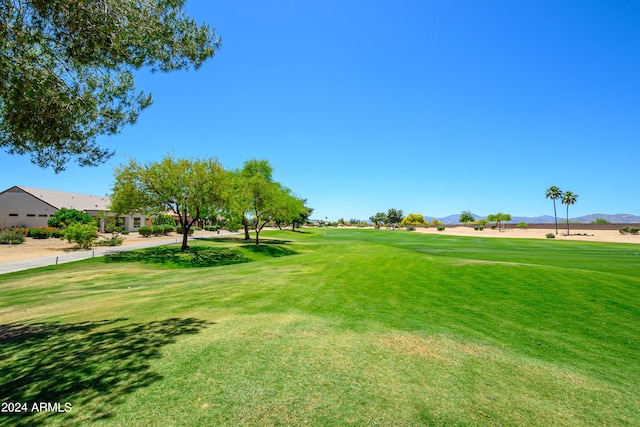 19892 N Shadow Mountain Dr, Surprise, AZ 85374 - view of home's community with a lawn, view of golf course, and a mountain view