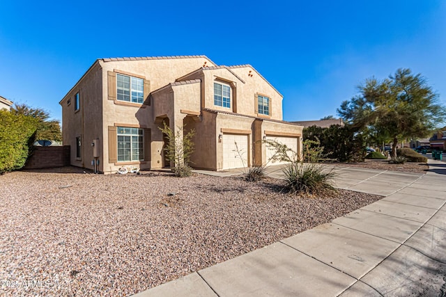 view of front of home with a garage