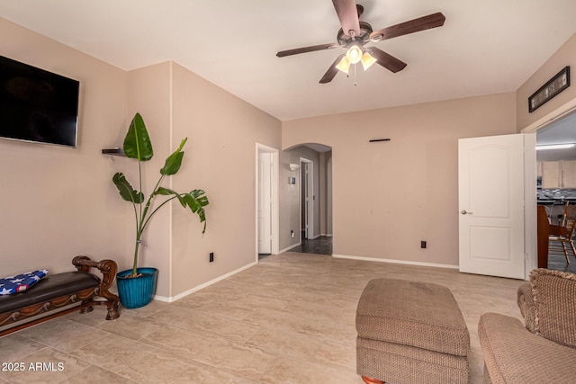 living room with ceiling fan