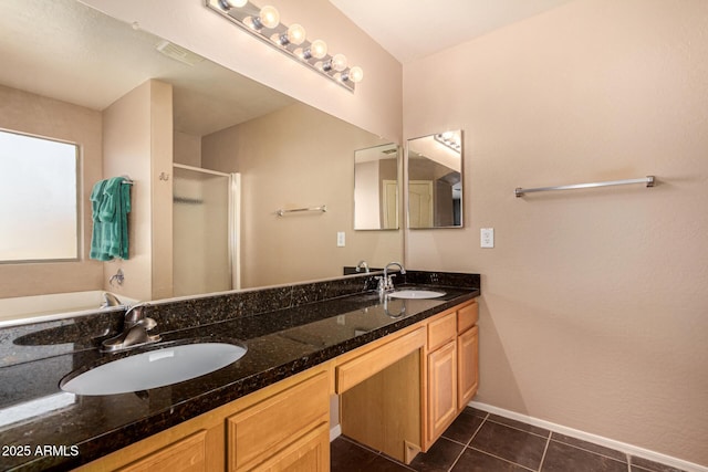 bathroom with tile patterned flooring, vanity, and independent shower and bath