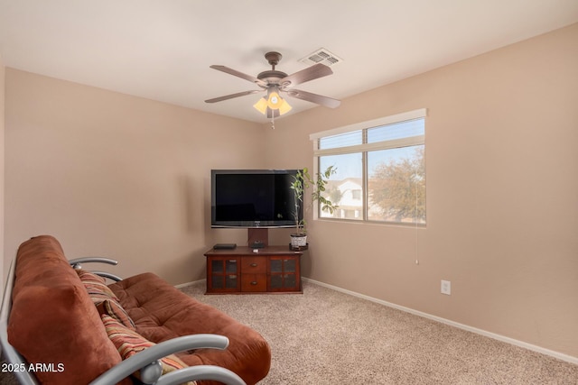 living room with light carpet and ceiling fan