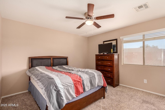 bedroom featuring ceiling fan and light colored carpet